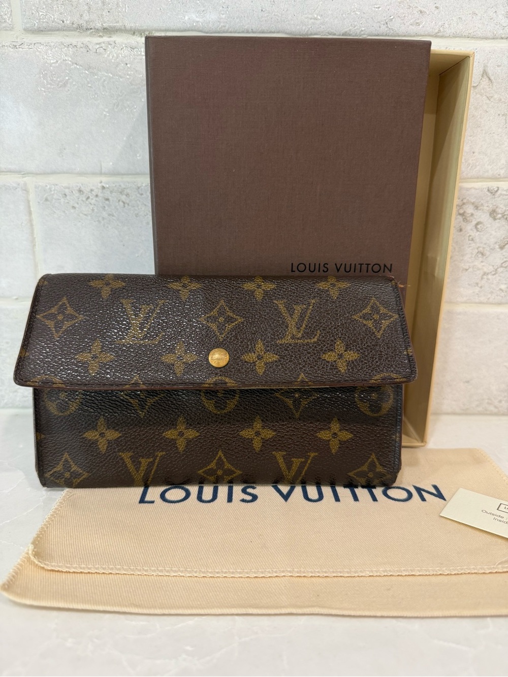 Louis Vuitton Monogram Canvas Flap Wallet in Brown